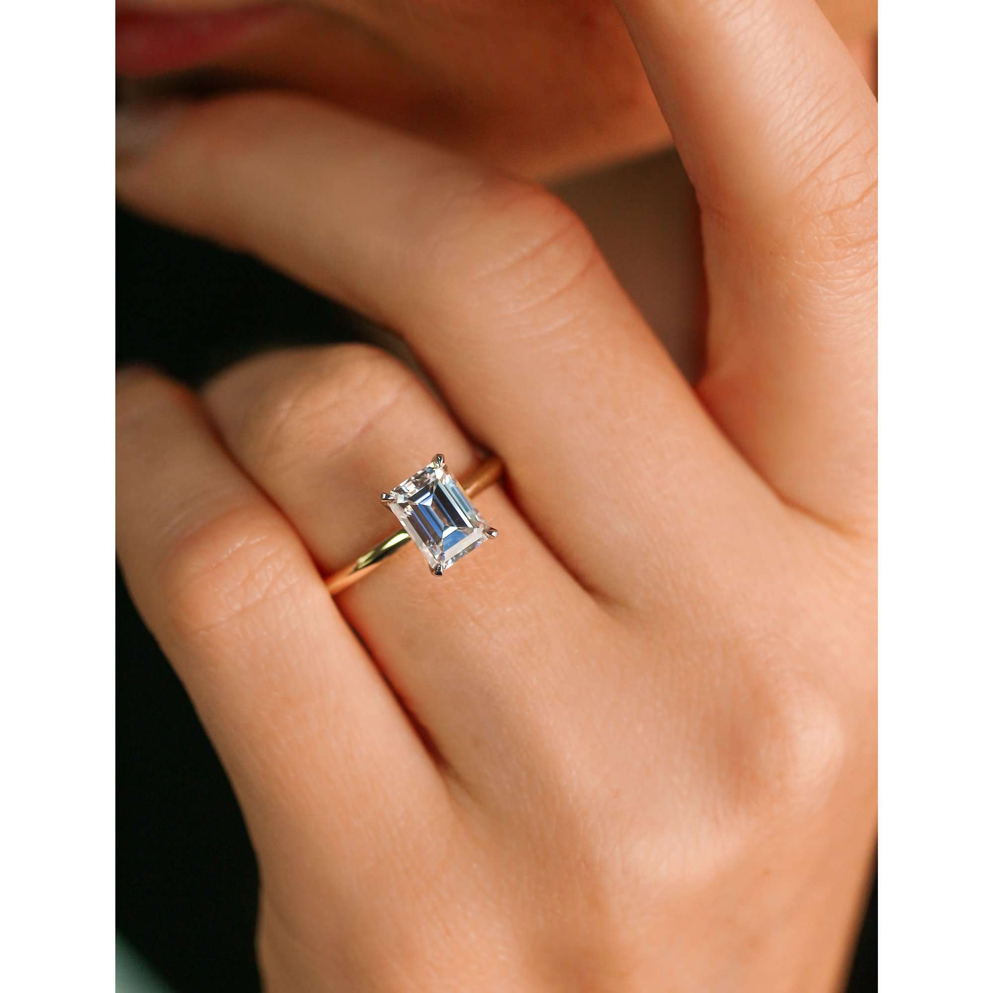 Solitaire Emerald Saber Ring - 1.75 Carat Moissanite - sample on a hand