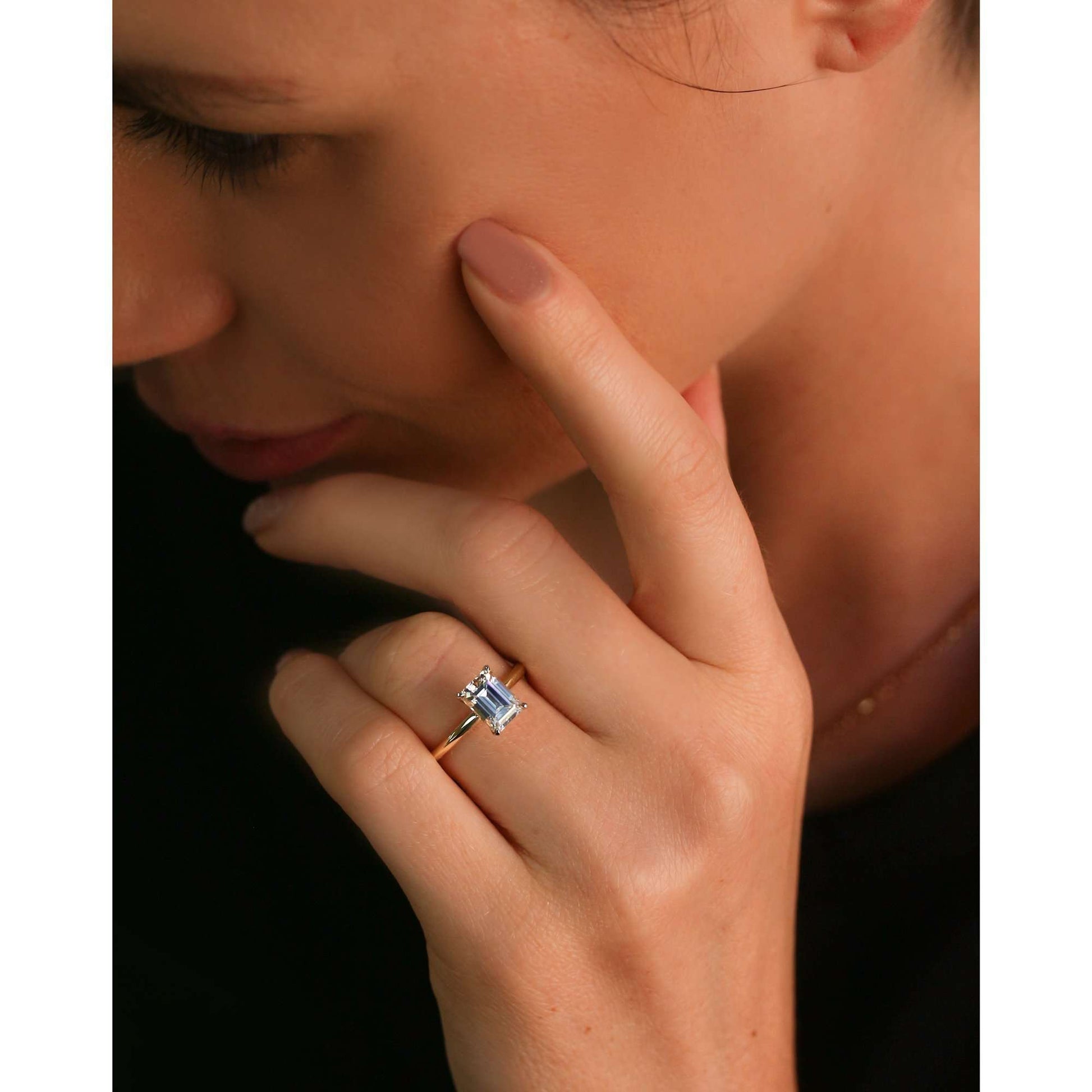 Solitaire Emerald Saber Ring - 1.75 Carat Moissanite - sample on a hand