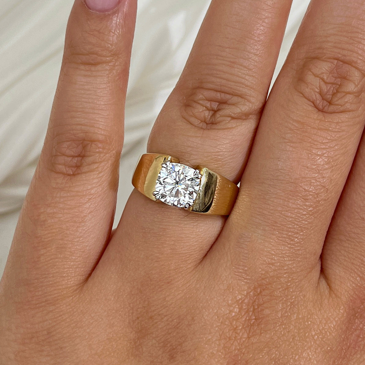 2 Carat Solitaire Cushion Extra Wide Heidi Ring - Yellow Gold, Size 7.5, Moissanite Center on a hand