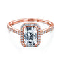 radiant-cut moissanite center with diamond side stones forming to a halo over a near eternity band in 14k rose gold