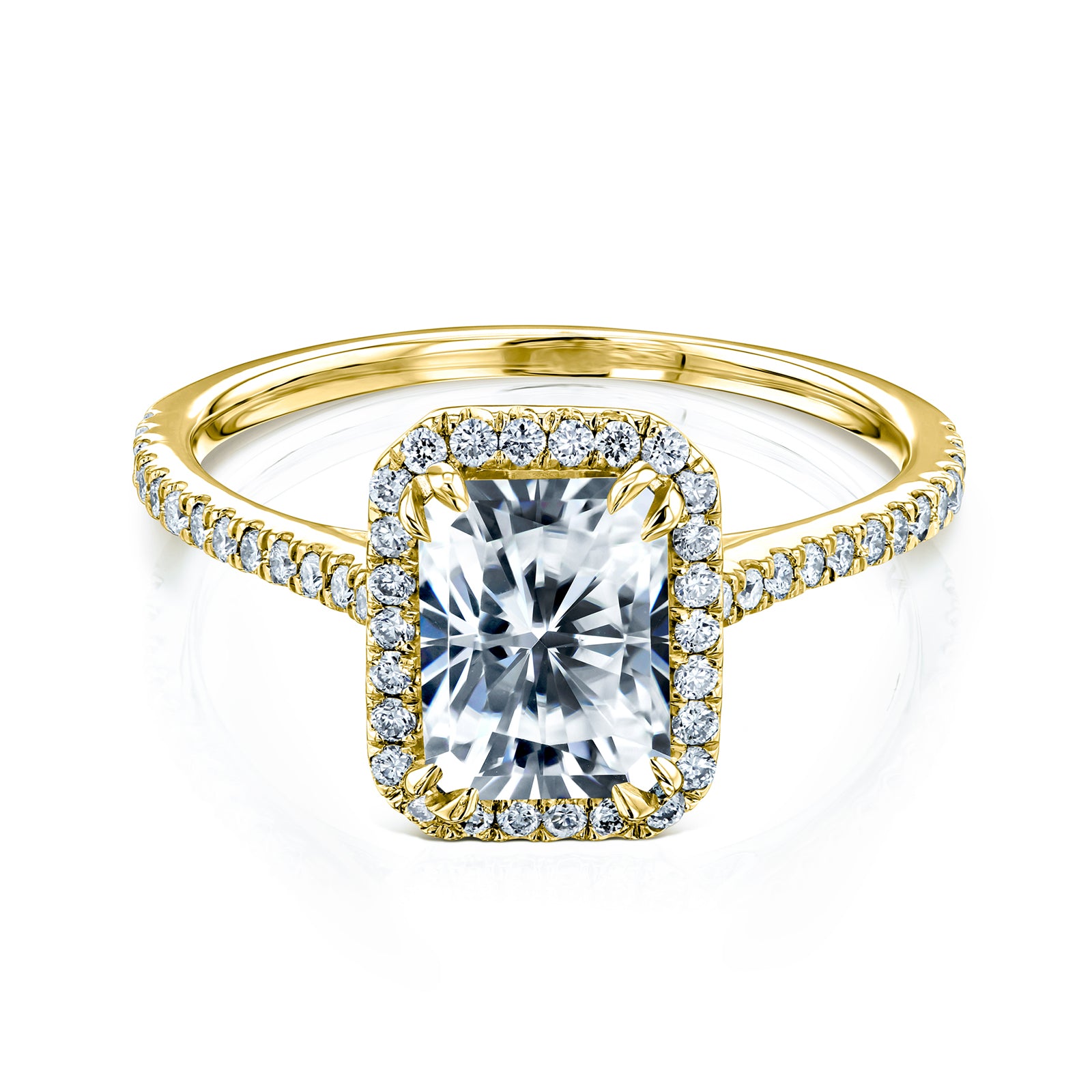 radiant-cut moissanite center with diamond side stones forming to a halo over a near eternity band in 14k yellow gold