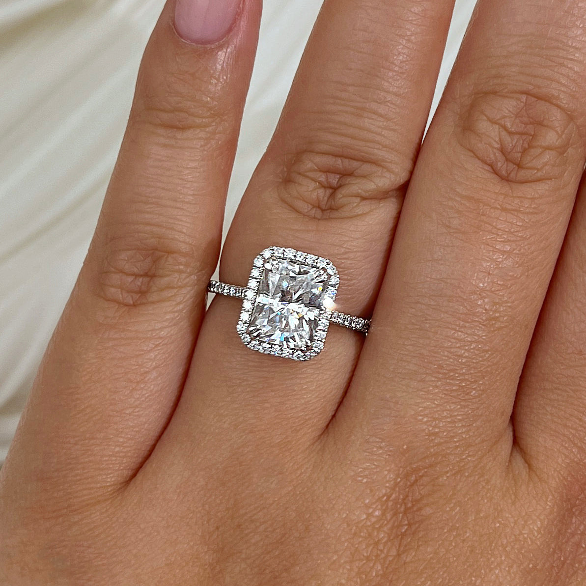 3 Carat Moissanite Radiant Original Ring - Size 7.5 White Gold on a hand
