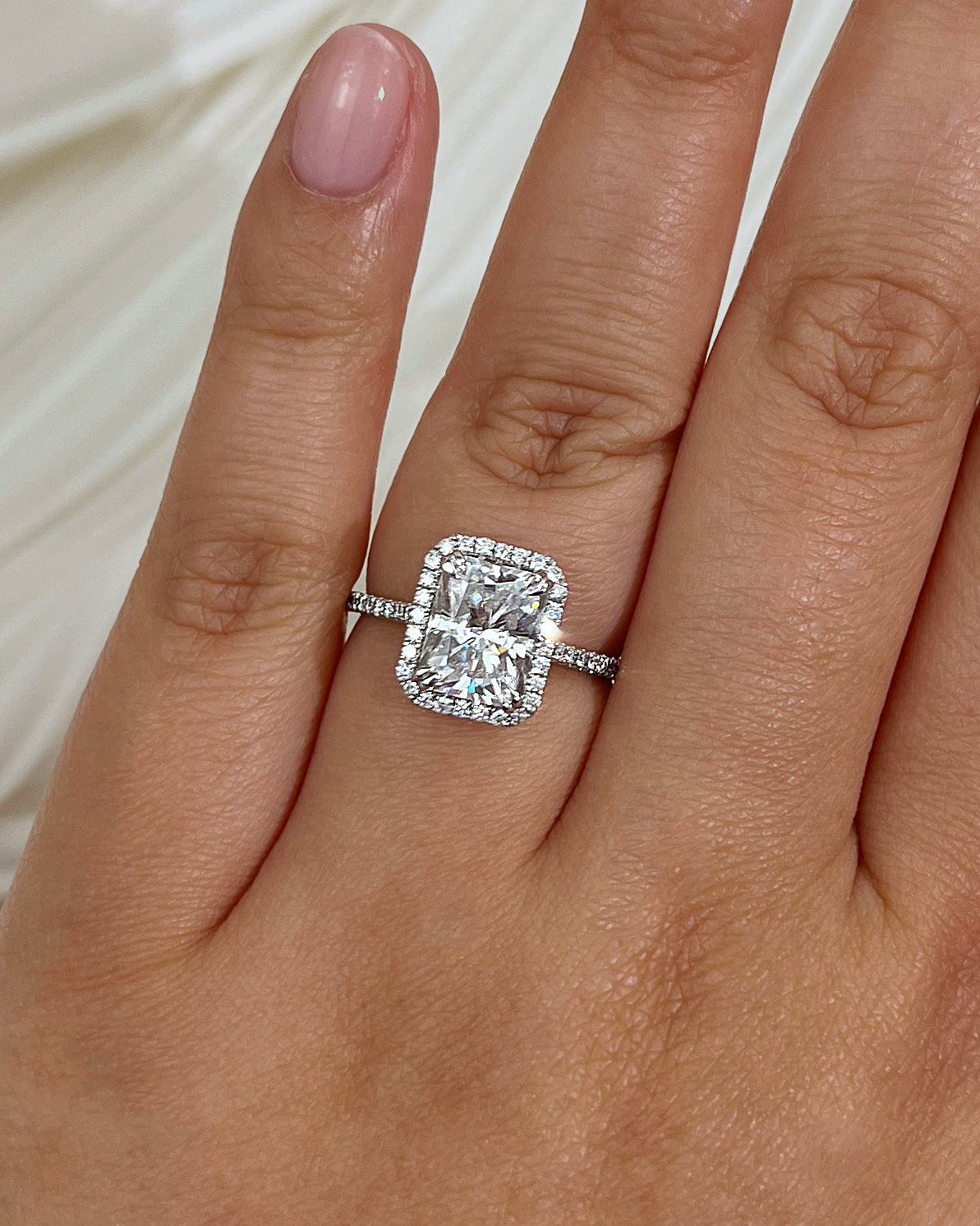 3 Carat Moissanite Radiant Original Ring - Size 7.5 White Gold on a hand