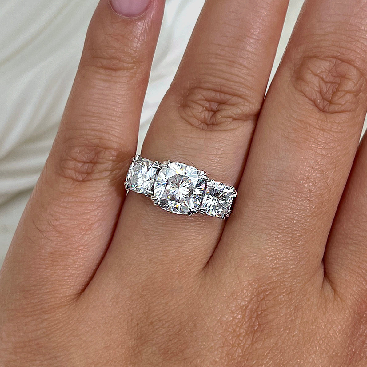 5 Carat Cushion 3-Stone Ring - Moissanite, Size 7.5, White Gold, on a hand