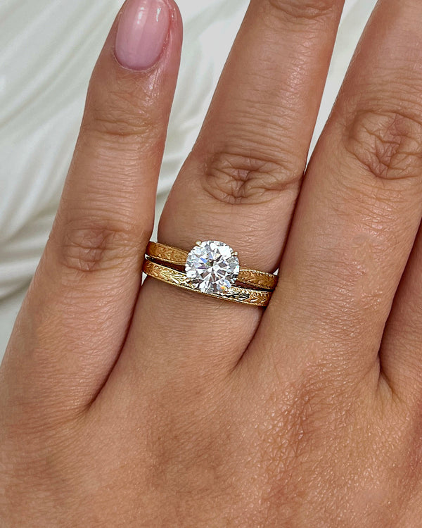 1.5 Carat Moissanite Valentina Bridal Set - Yellow Gold Size 8 on a hand
