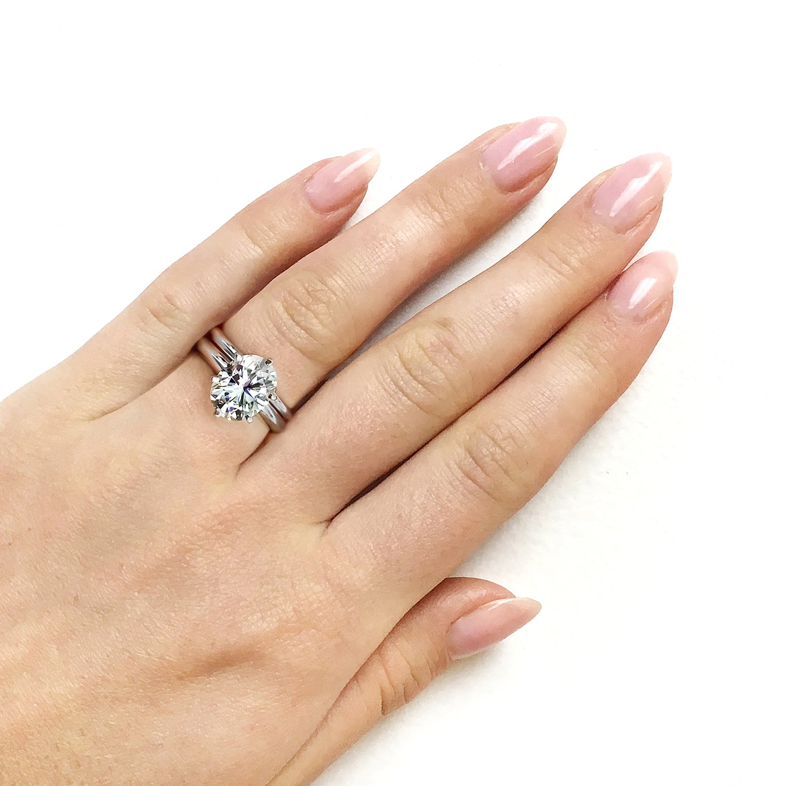 2.1 Carat Moissanite Solitaire 6-Prong Joan Bridal Set - on a hand