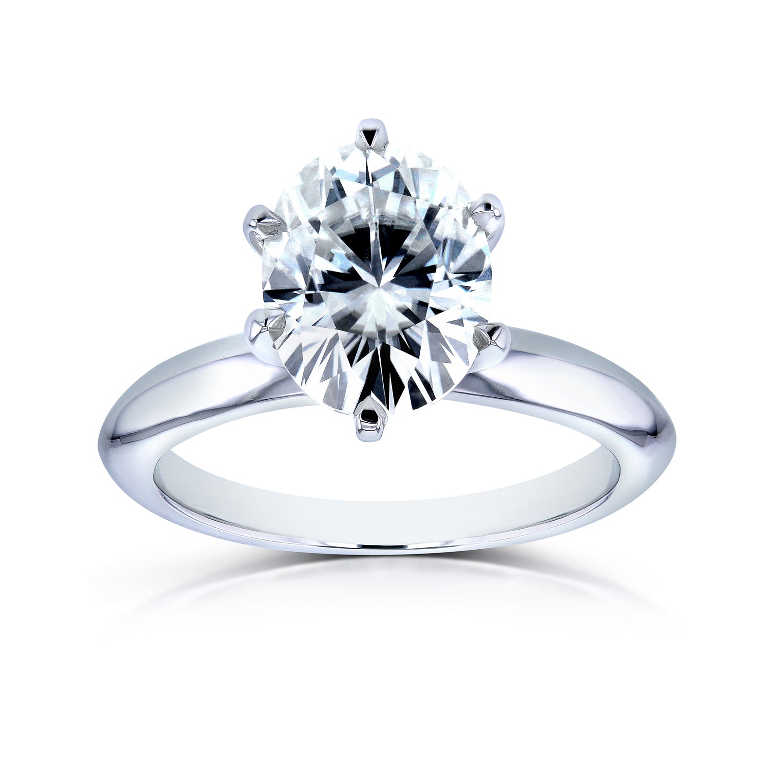 A classic solitaire engagement ring featuring a round brilliant-cut moissanite set in a polished white gold band