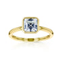 white-background image of 1 carat Asscher bezel-set in yellow gold