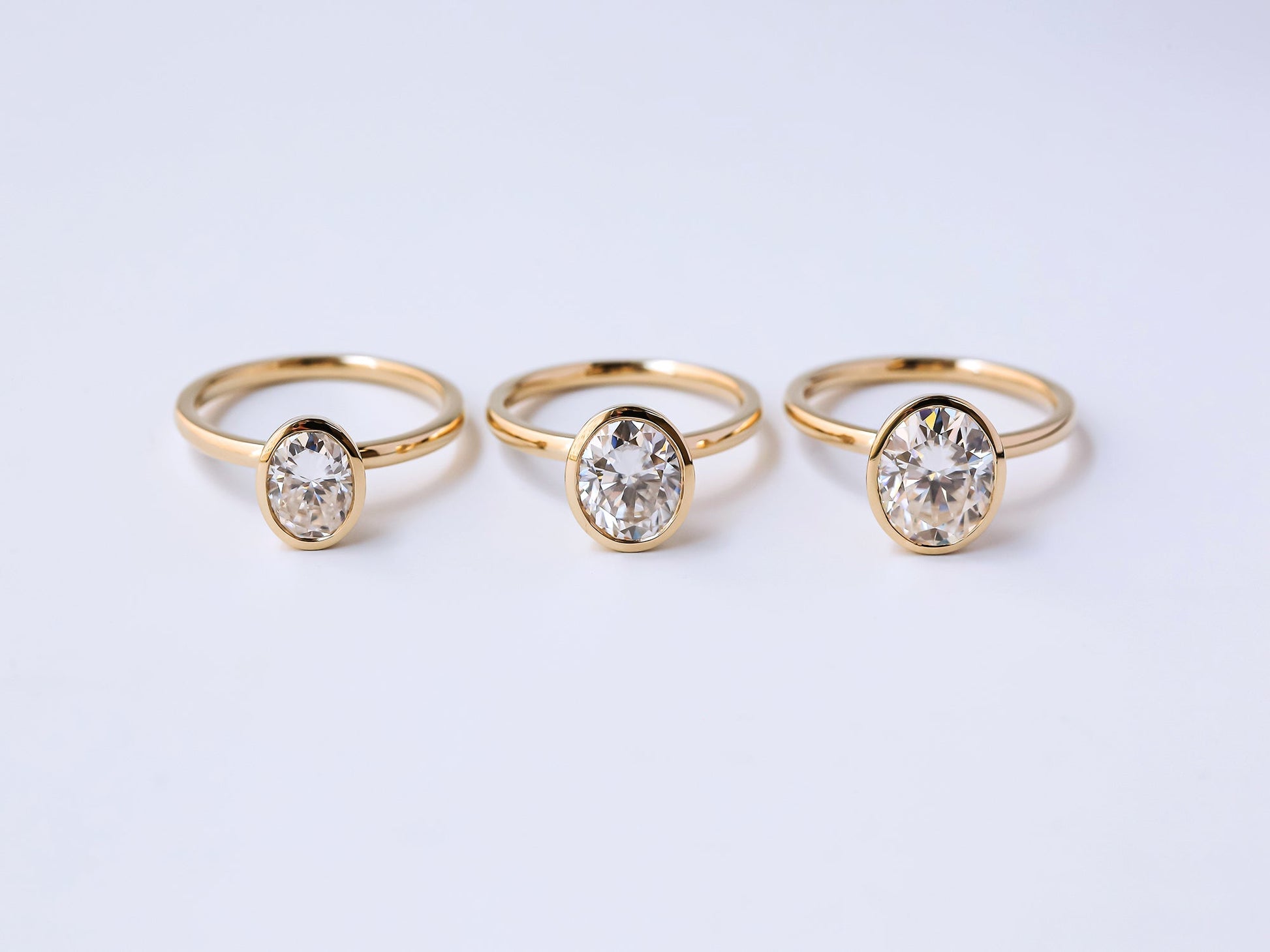 Kobelli Oval Diamond Bezel Solitaire Engagement Rings