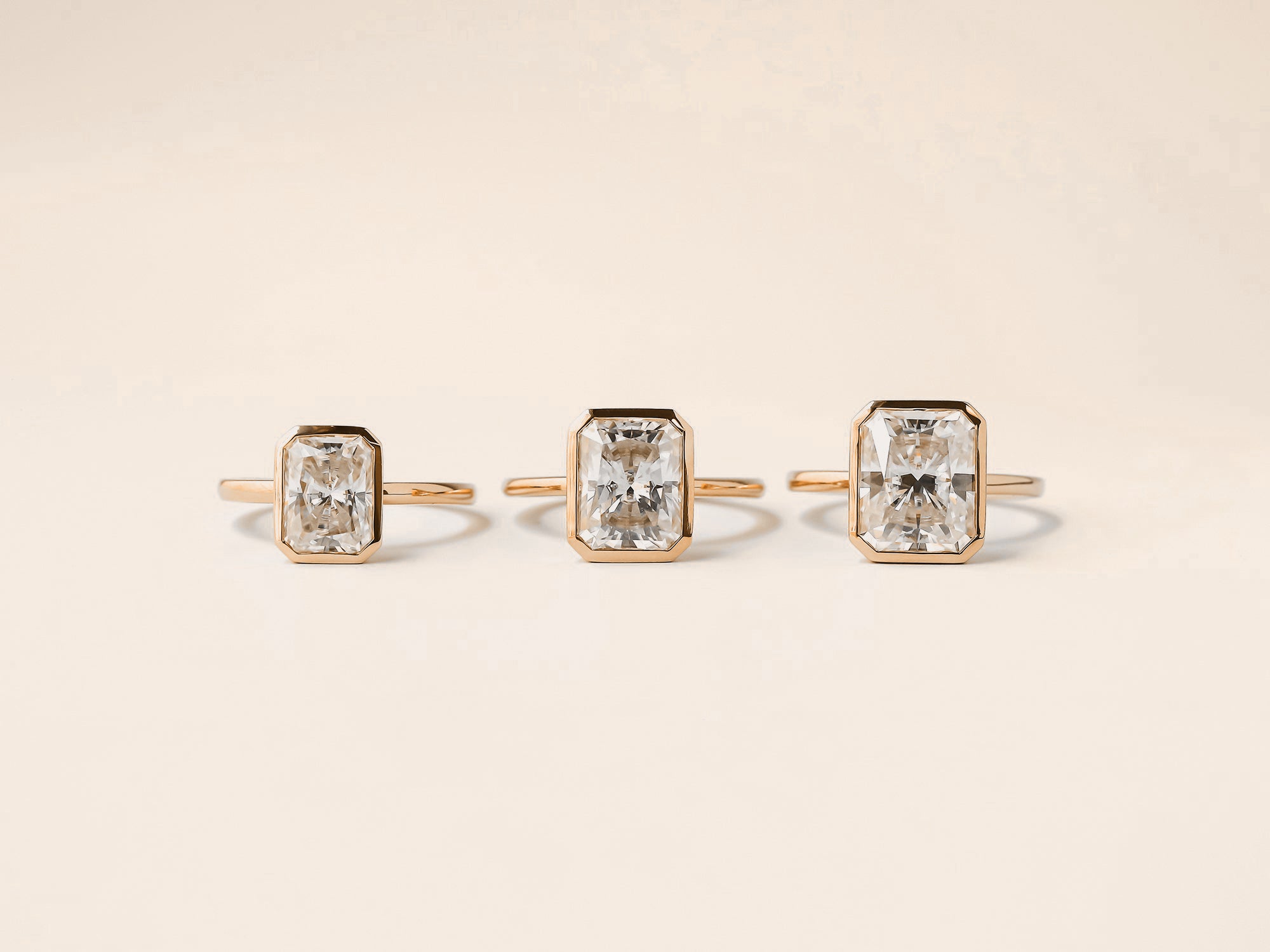 radiant cut diamonds from the A.M.O.R.E. bezel engagement rings collection