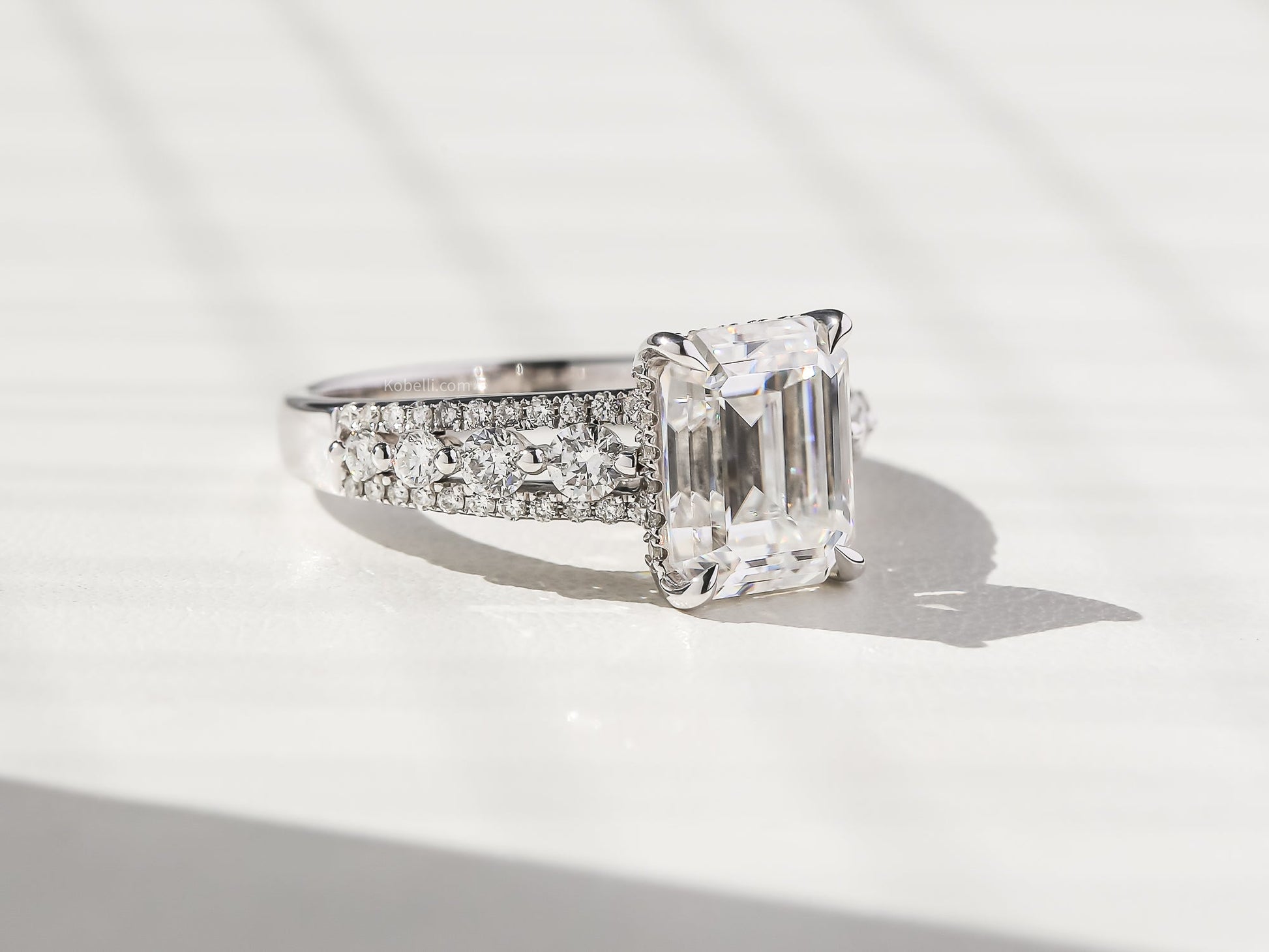 Kobelli Emerald Moissanite & Round Diamonds Triple Row Engagement Ring
