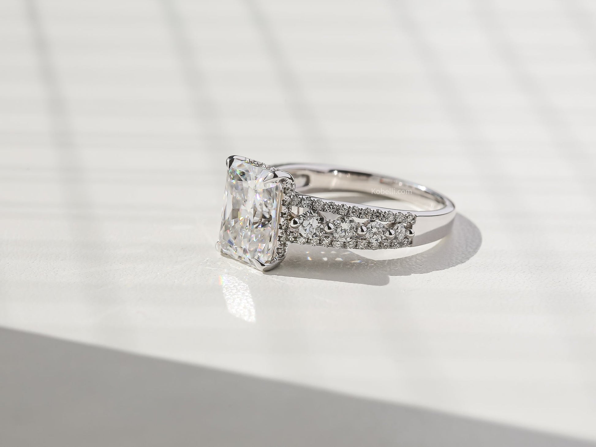 Kobelli Radiant Moissanite & Round Diamonds Triple Row Engagement Ring