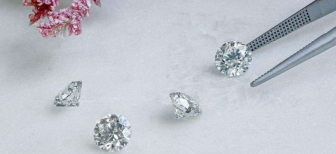 picking loose round brilliant diamonds with tweezers