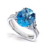 Topázio azul londrino oval e diamante extravagante