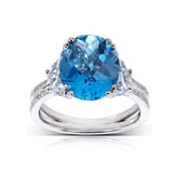 Topázio azul londrino oval e diamante extravagante