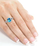 Kobelli Smaragdschliff-Schweizer Blautopas und Diamant-Halo-Ring mit geteiltem Schaft, 2 Karat CTW, 14 Karat Weißgold