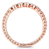 Kobelli ribbet navettmønster diamant aksentbånd 10k rosa gull