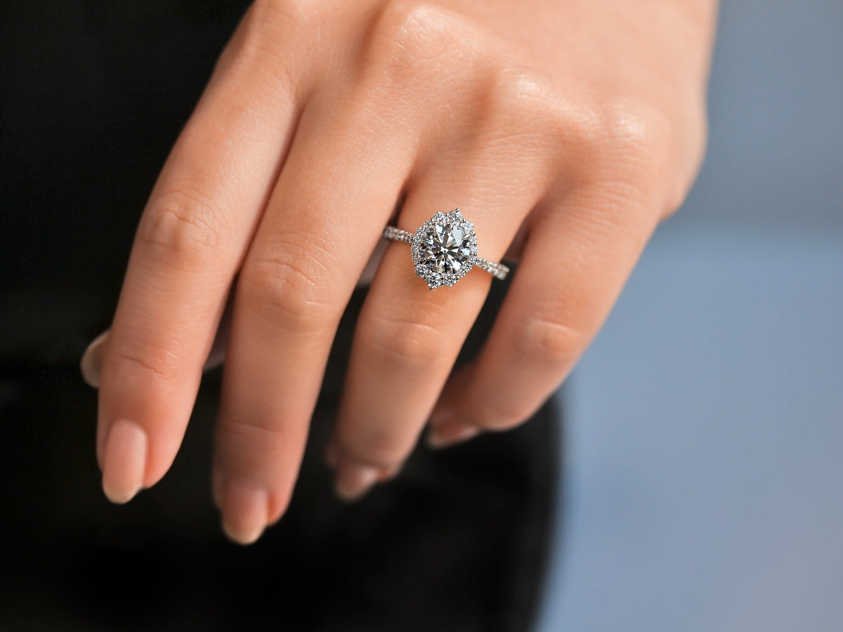 rococo halo ring on a hand