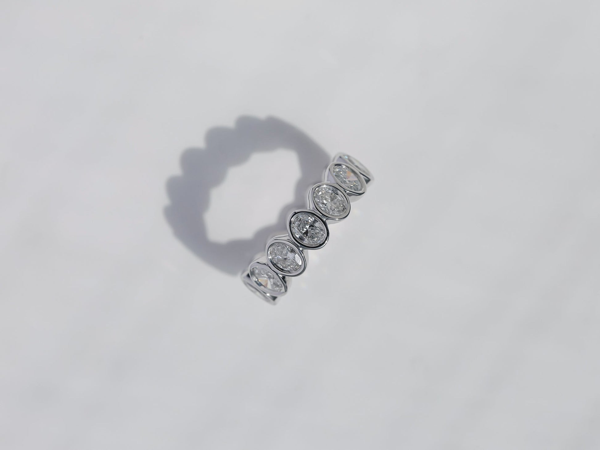 Kobelli Diamond Oval-cut Diamond Eternity Band