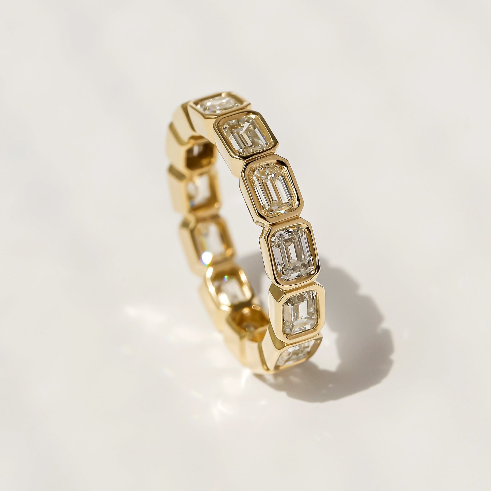 Kobelli Lab Grown Emerald Diamond Bezel Eternity Band - Lifestyle Image