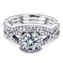Kobelli Round Moissanite Fancy Halo Cross Shank Gold Bridal Set