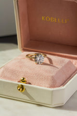 Kobelli runder Verlobungsring mit Moissanit und Diamant