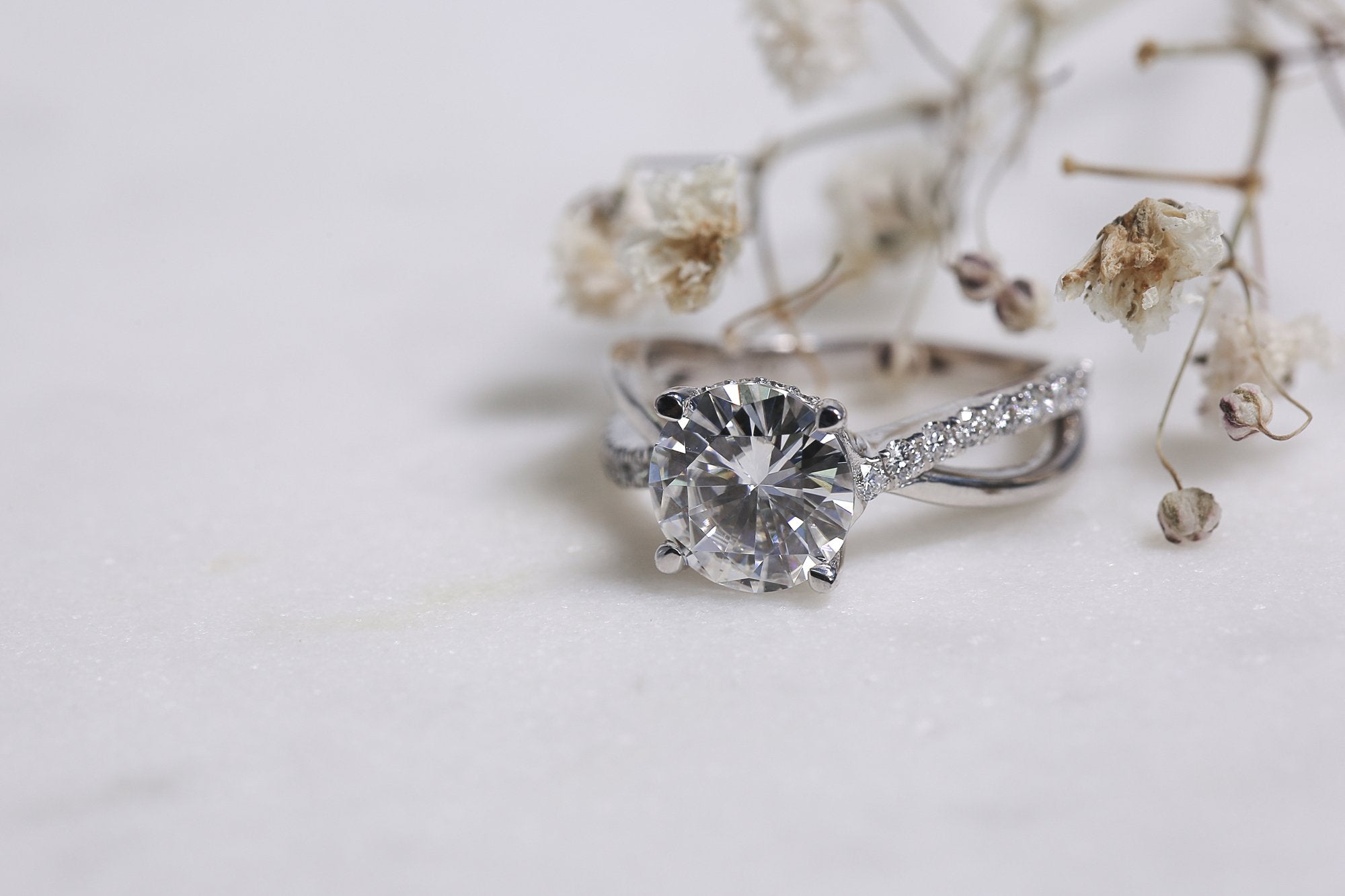 Kobelli 2 Carat Lab-grown Diamond Accented Ribbon Bypass Moissanite Engagement Ring