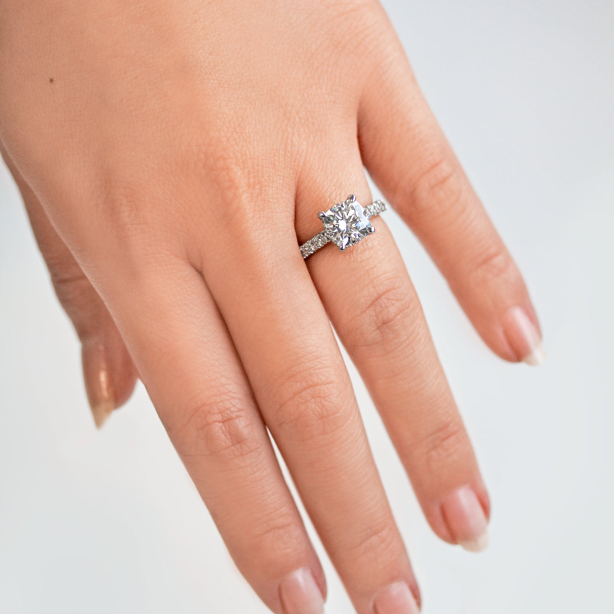 Camden Ring - 2 carat cushion center over a single row of diamonds lining the band in white gold