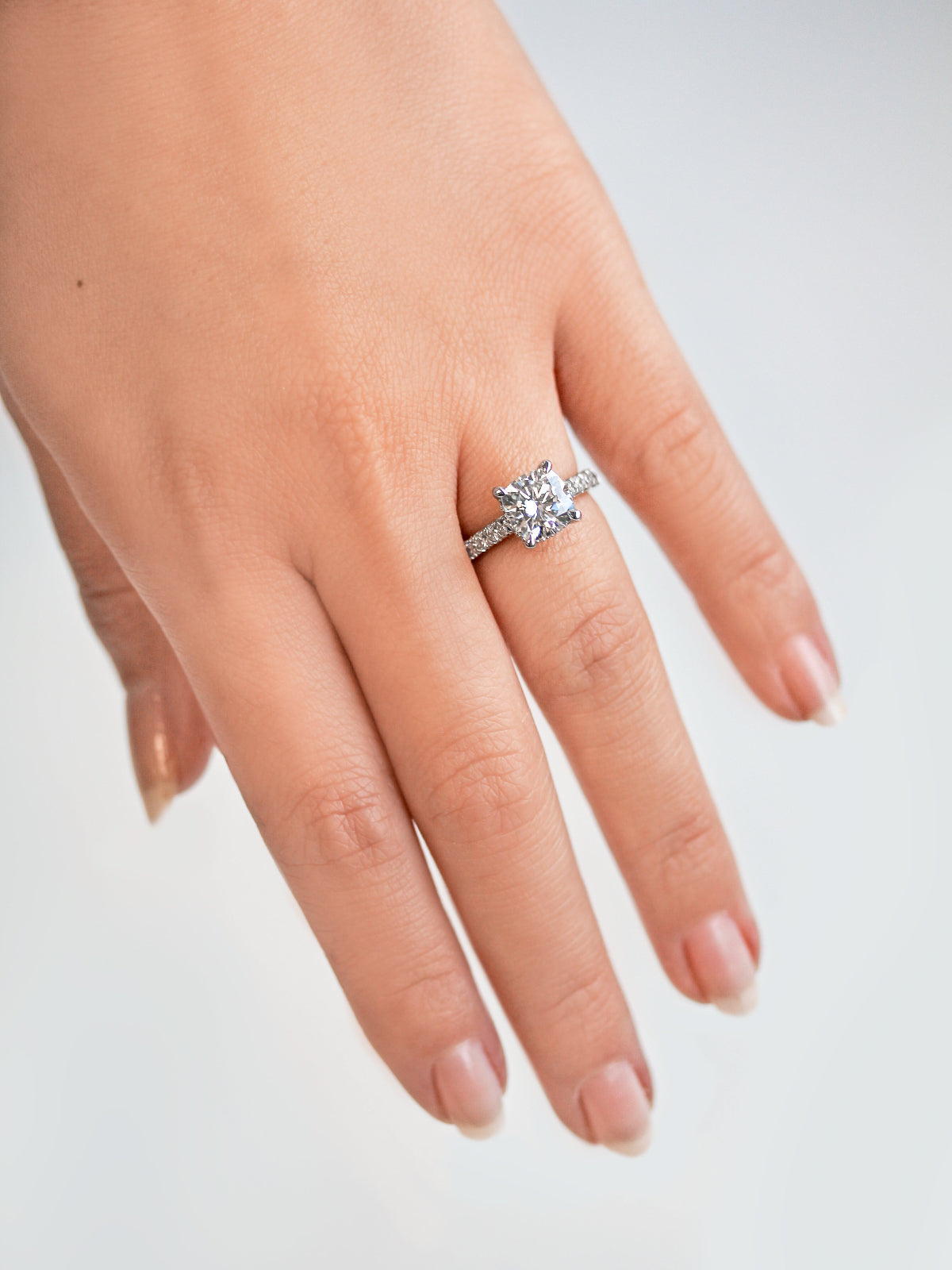 Camden Ring - 2 carat cushion center over a single row of diamonds lining the band in white gold
