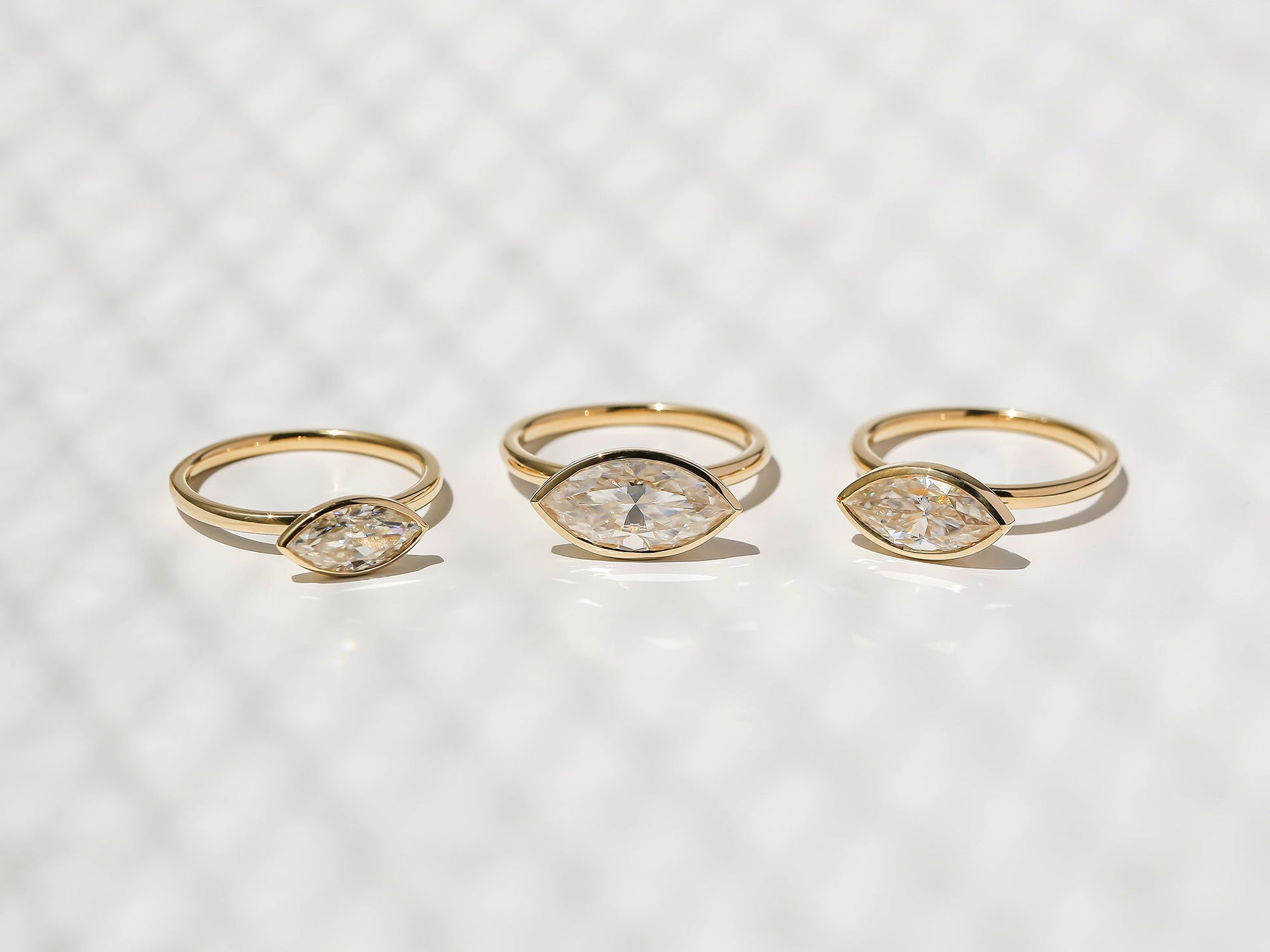 Kobelli Bezel Solitaire Diamond Rings