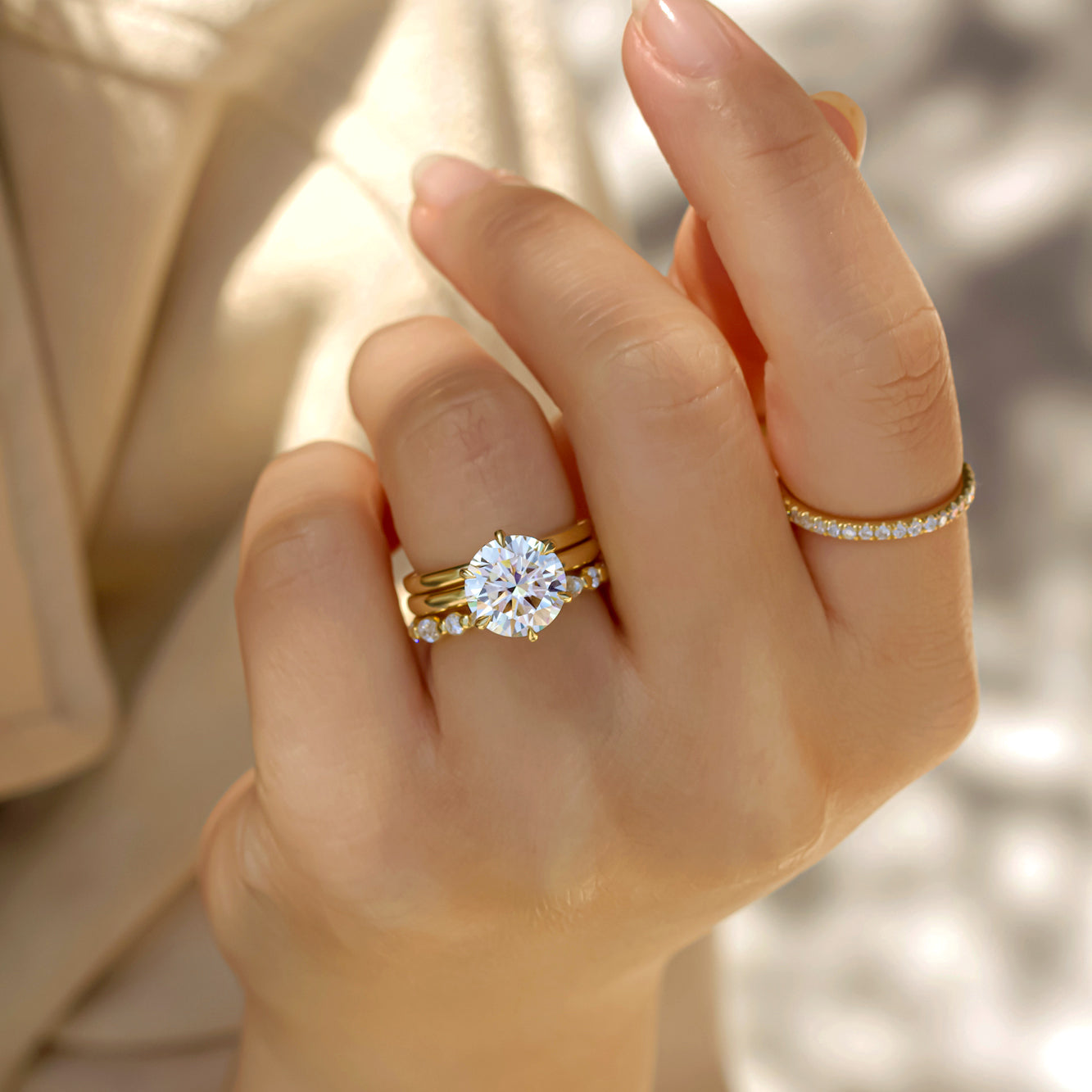 Rosemairie Bridal Set in Size 5.5 worn with other yellow gold bands