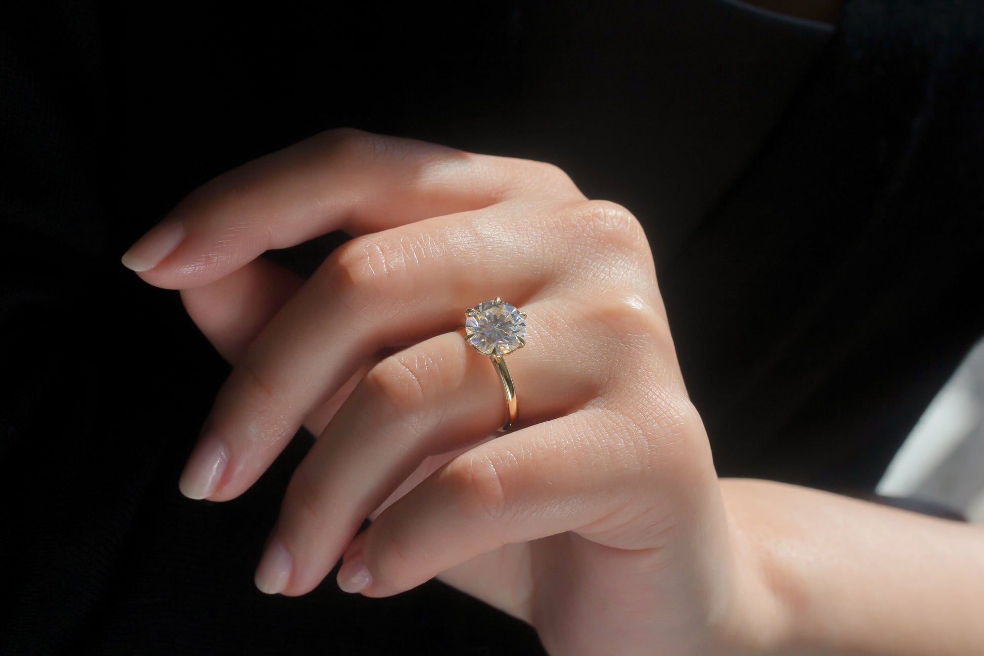 Kobelli Rosemarie Engagement Ring - raised angle on hand