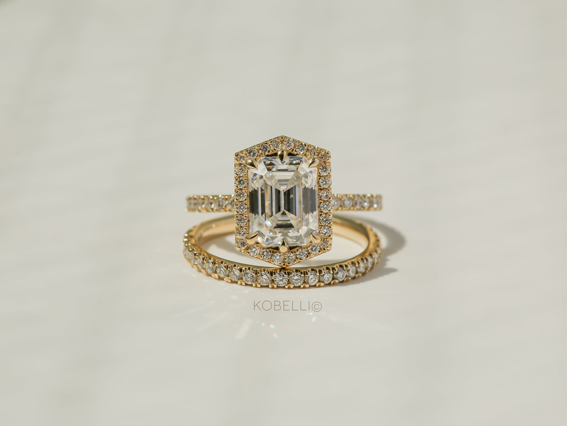 Kobelli Hexagon Halo 2.45ct Emerald Moissanite and Diamond Rings