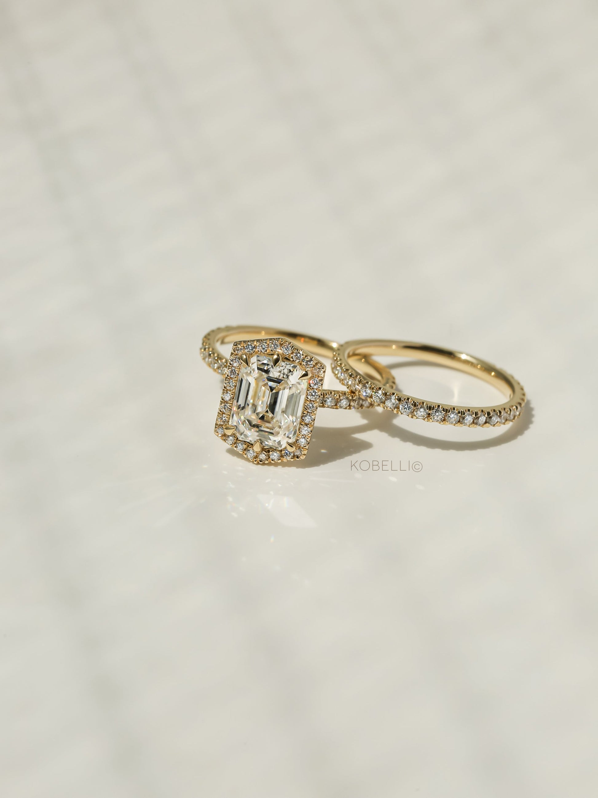 Kobelli Hexagon Halo 2.45ct Emerald Moissanite and Diamond Rings