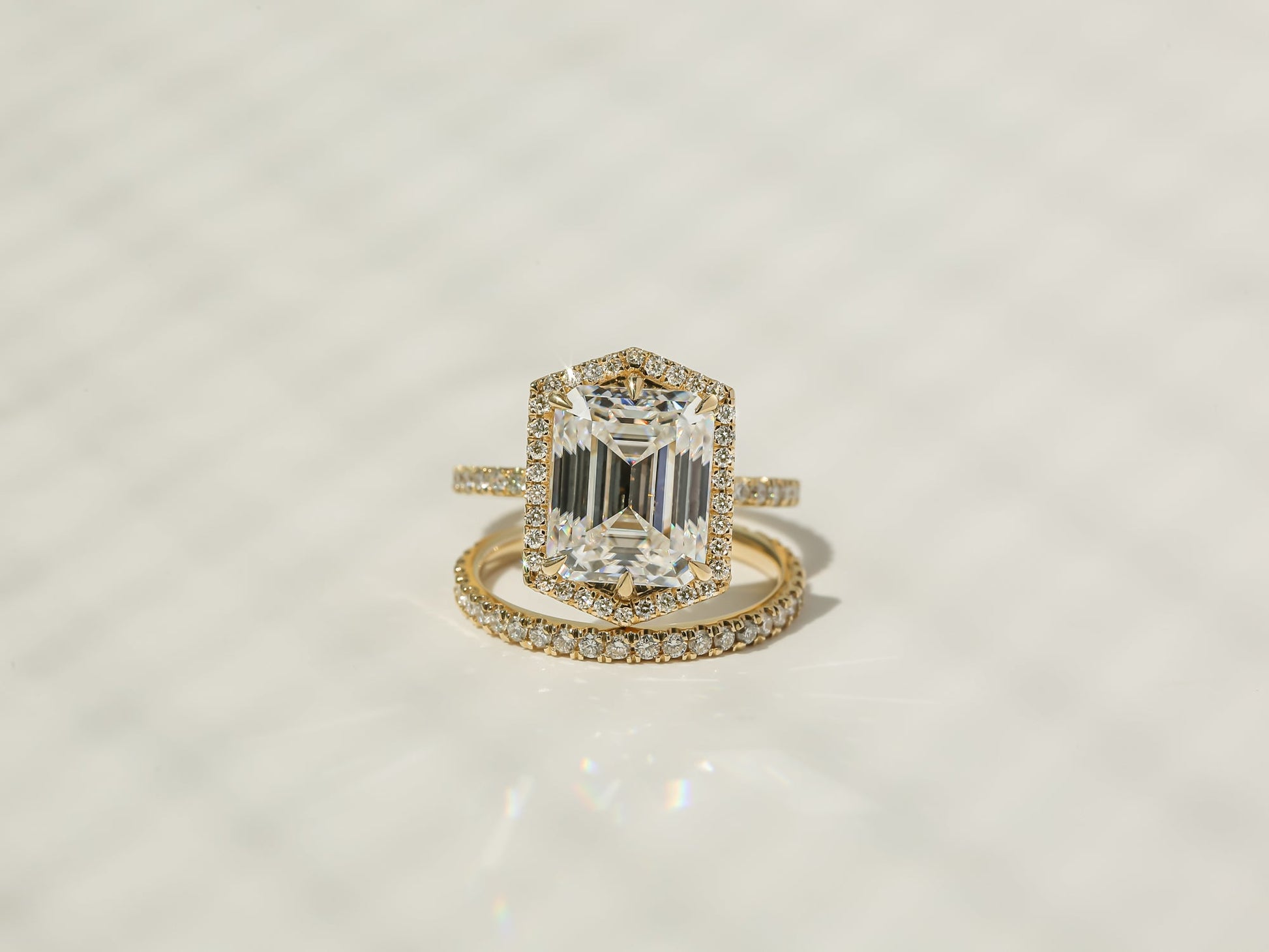 Kobelli Hexagon Halo 4.90ct Emerald Moissanite and Diamond Rings