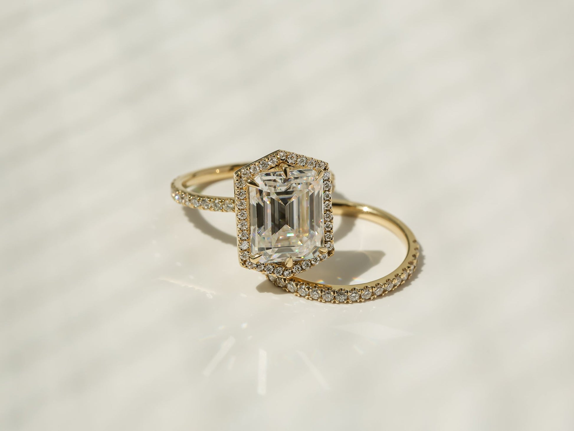 Kobelli Hexagon Halo 4.90ct Emerald Moissanite and Diamond Rings