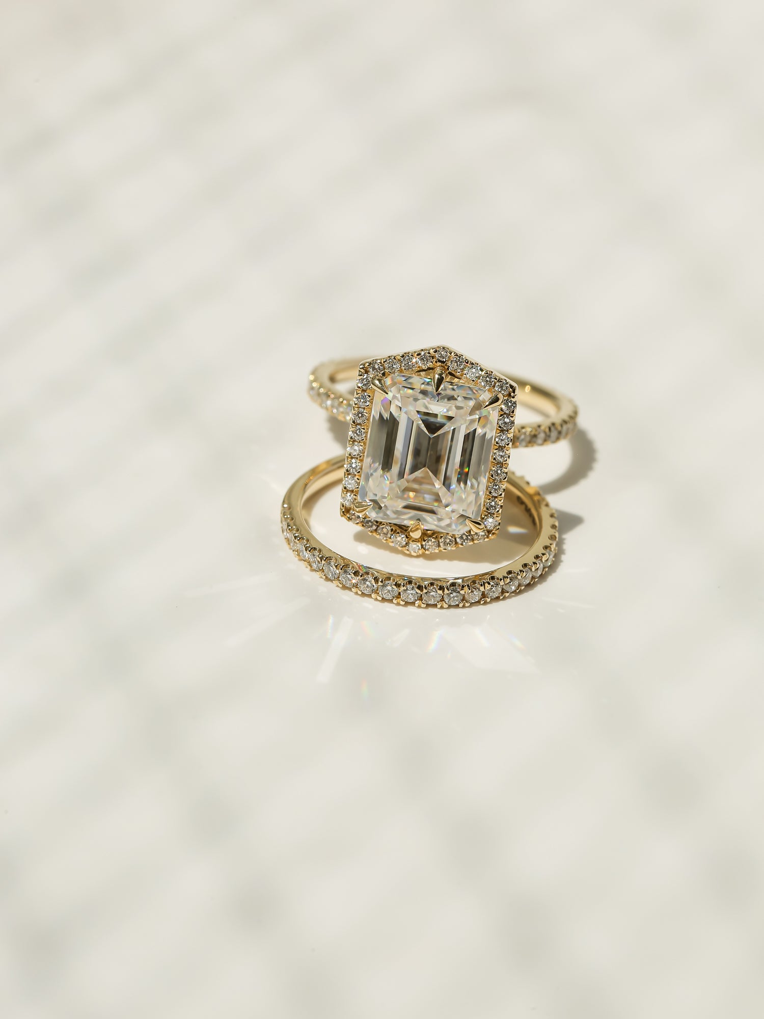 Kobelli Hexagon Halo 4.90ct Emerald Moissanite and Diamond Rings
