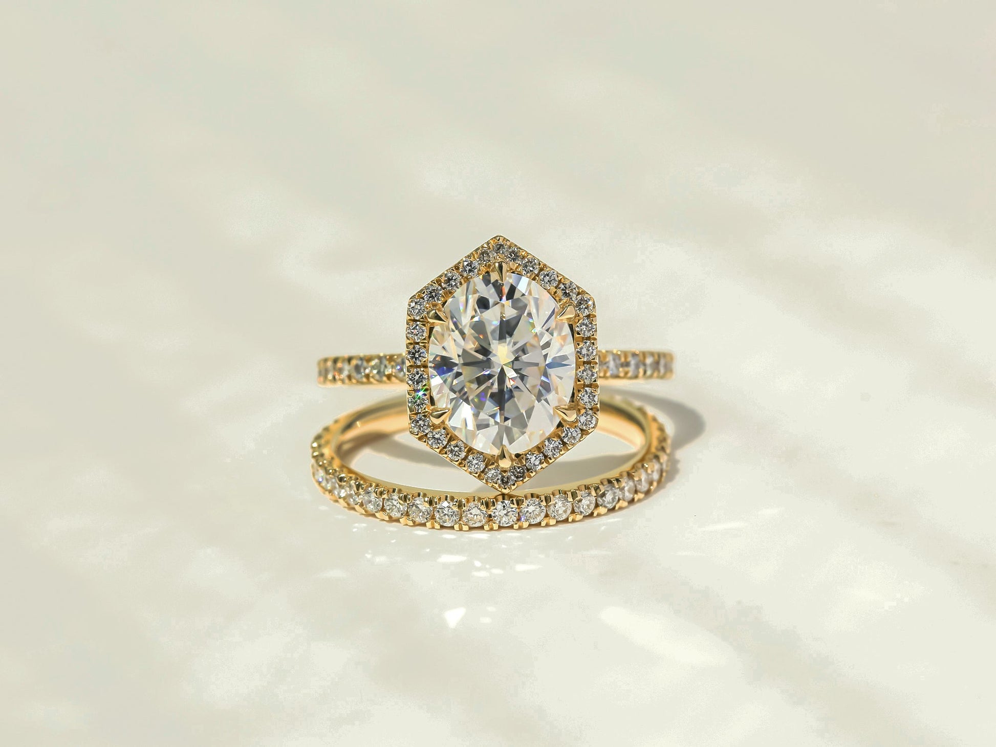 Kobelli Hexagon Halo 3ct Oval Moissanite and Diamond Rings