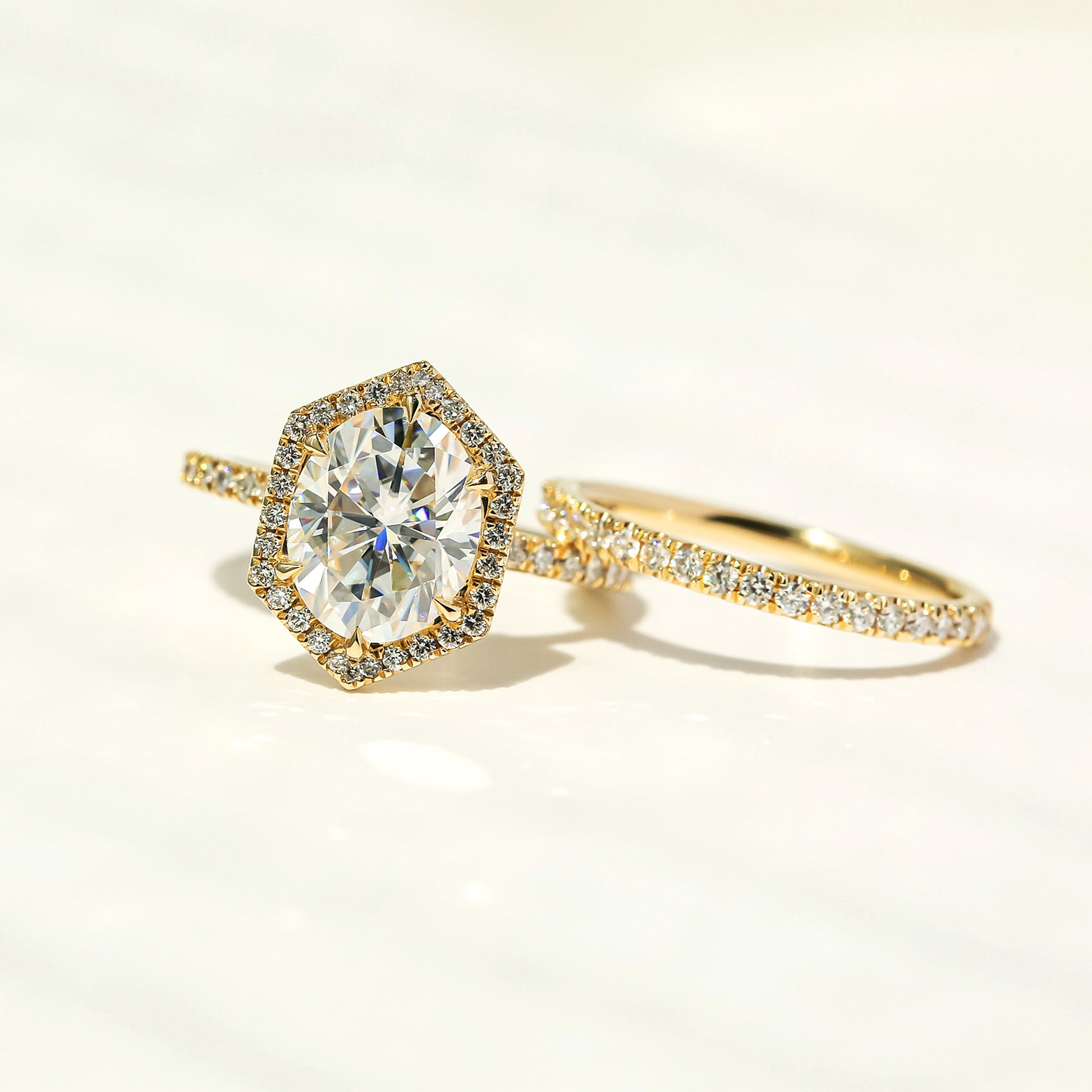 Kobelli Hexagon Halo 3ct Oval Moissanite and Diamond Rings