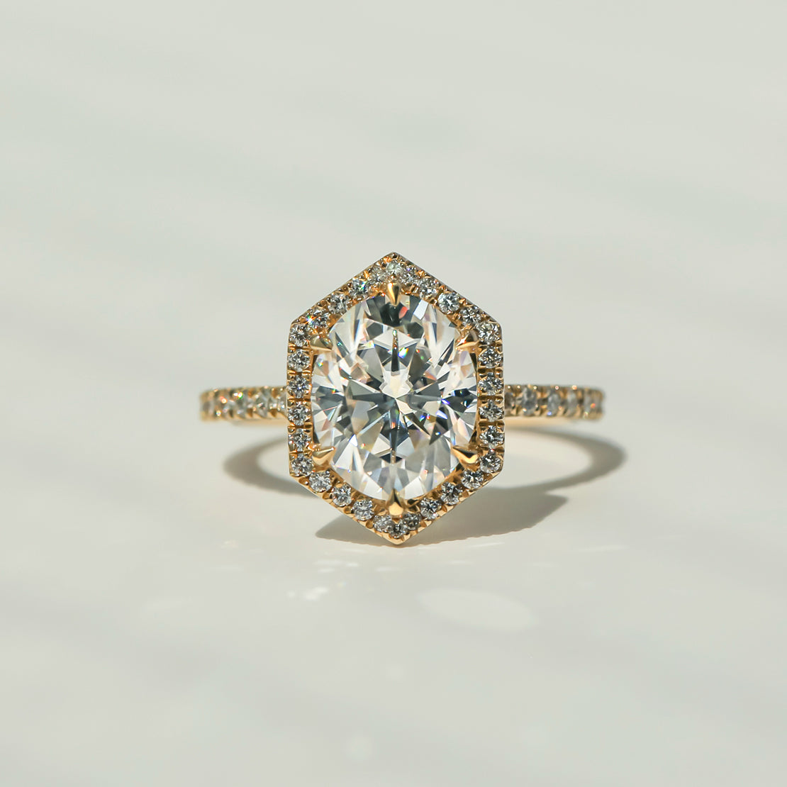 Kobelli Hexagon Halo 3ct Oval Moissanite & 0.50ct Diamond Engagement Ring in 14k Gold - Saturday Collection