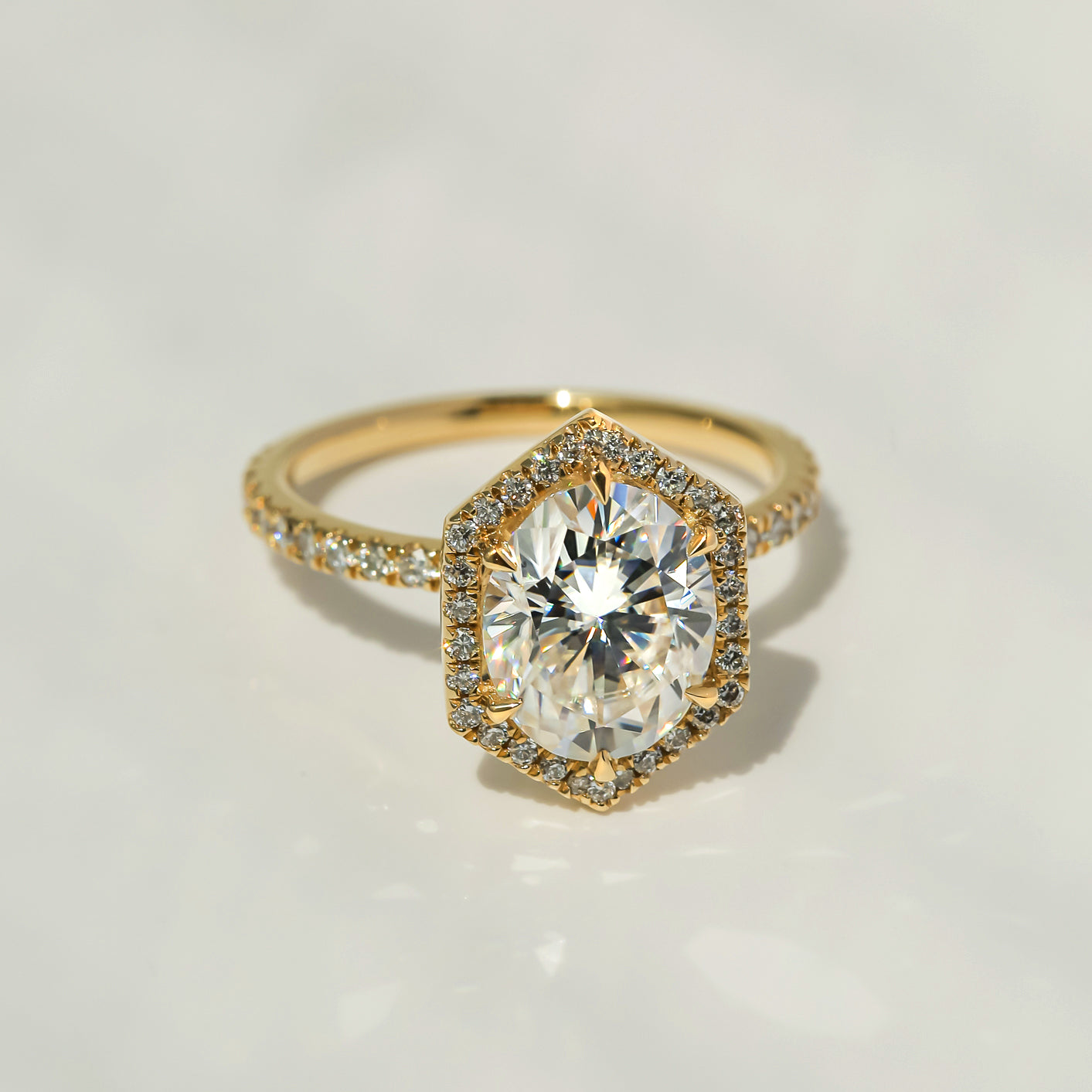 Kobelli Hexagon Halo 3ct Oval Moissanite & 0.50ct Diamond Engagement Ring in 14k Gold - Saturday Collection