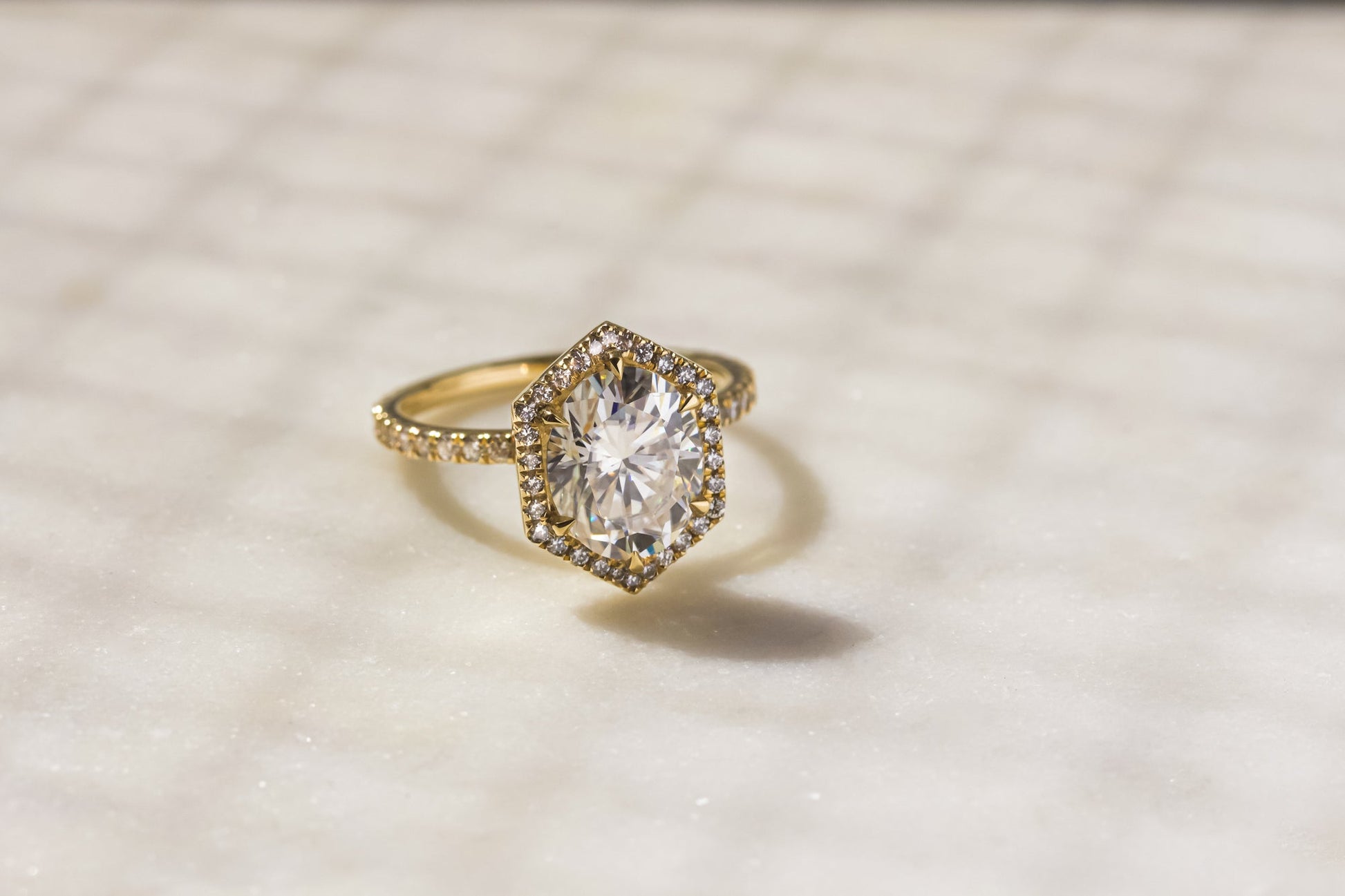 Kobelli Hexagon Halo 3ct Oval Moissanite & 0.50ct Diamond Engagement Ring in 14k Gold - Saturday Collection