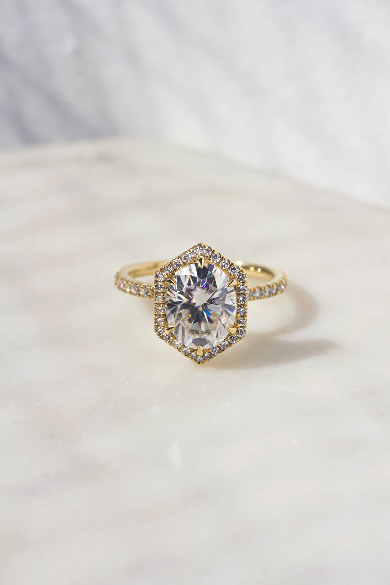 Kobelli Hexagon Halo 3ct Oval Moissanite & 0.50ct Diamond Engagement Ring in 14k Gold - Saturday Collection