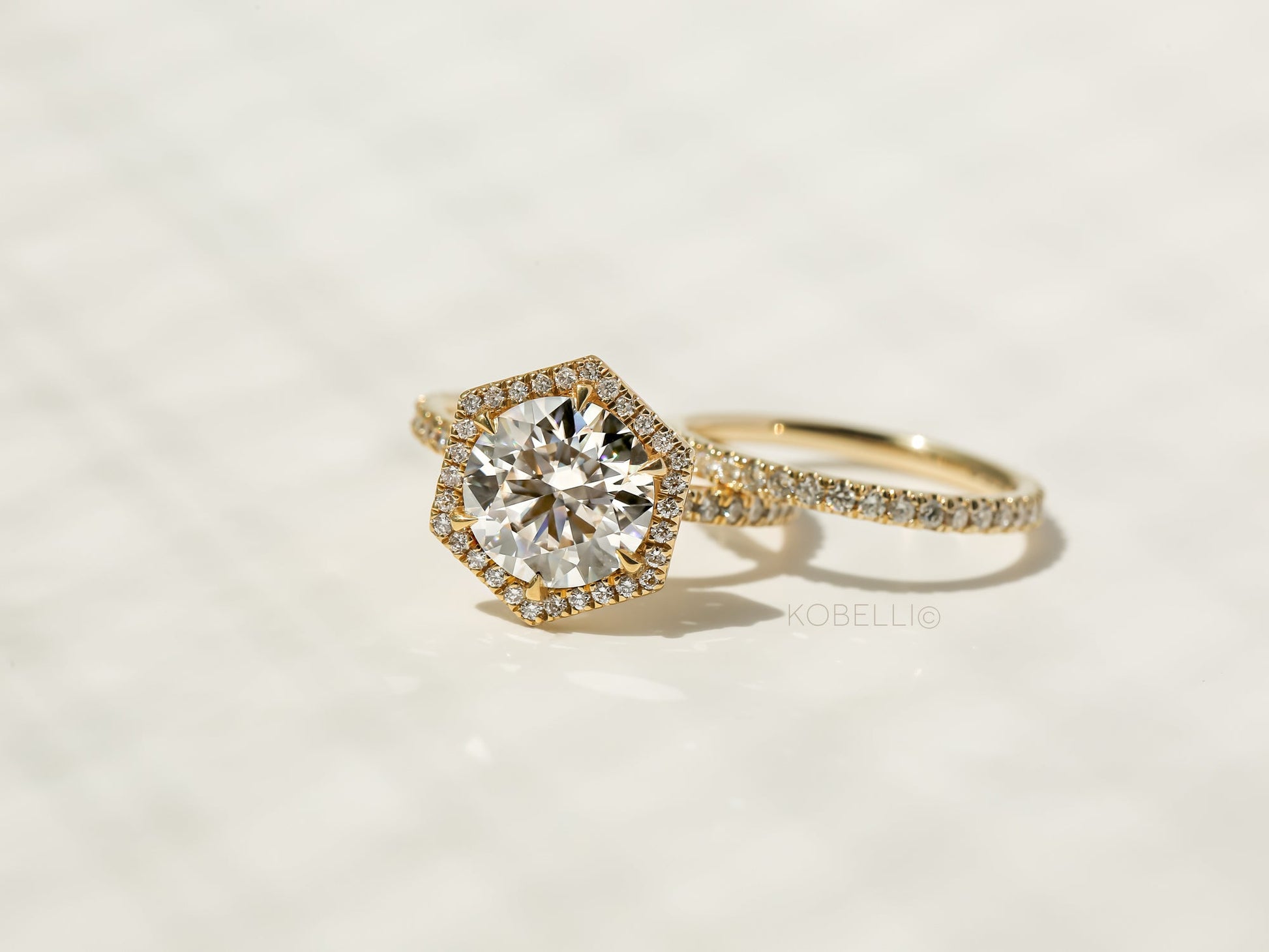 Kobelli Hexagon Halo 3.1ct Round Moissanite and Diamond Rings