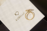 Kobelli Hexagon Halo 3,1 quilates de moissanite redondo e anel de noivado de diamante de 0,50 quilates em ouro 14 quilates - coleção de sábado