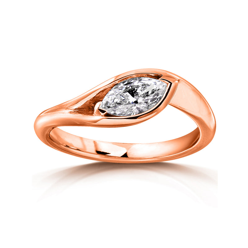 Asymmetric ring with a diamond in pink gold